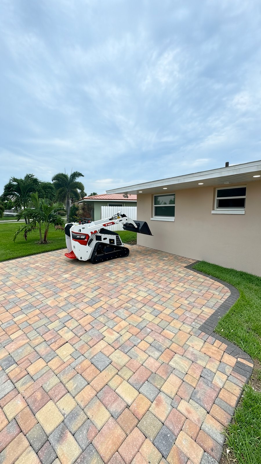 Design concept render of a paver or turf project — AI visualization, not a completed job