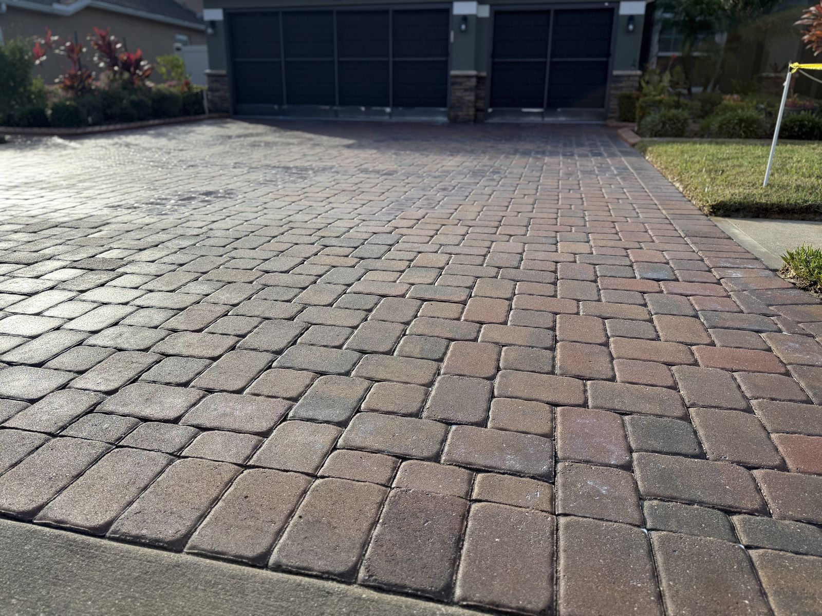 Paver surface cleaned and sealed by Groundworks, Brevard County