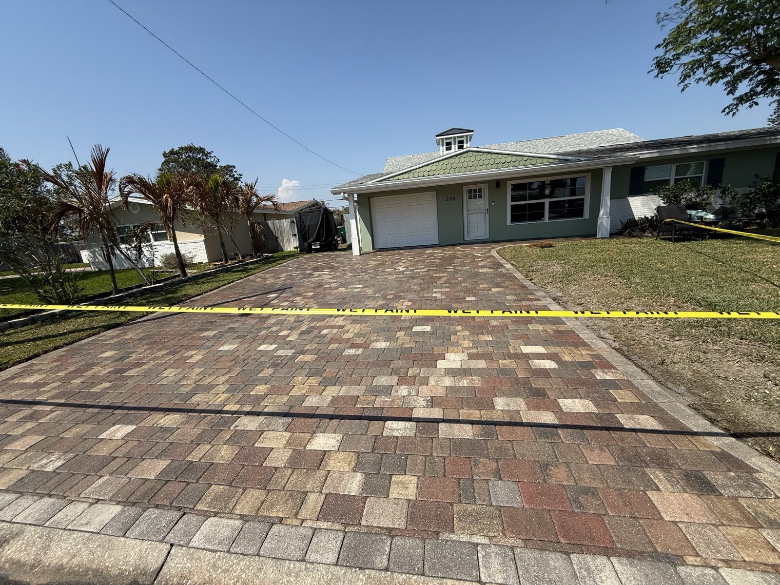 Paver surface cleaned and sealed by Groundworks, Brevard County