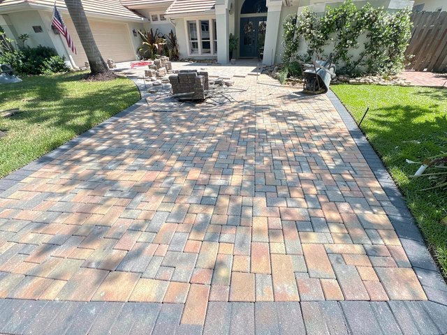 Design concept render of a paver or turf project — AI visualization, not a completed job